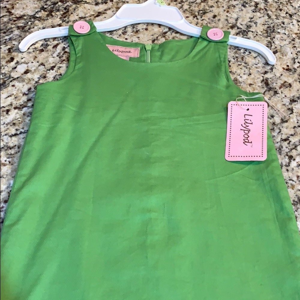 Girls lime green dress with pink buttons
